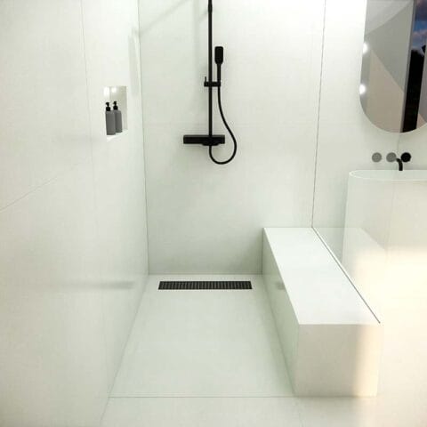 Concrete shower base model linea color honed white.